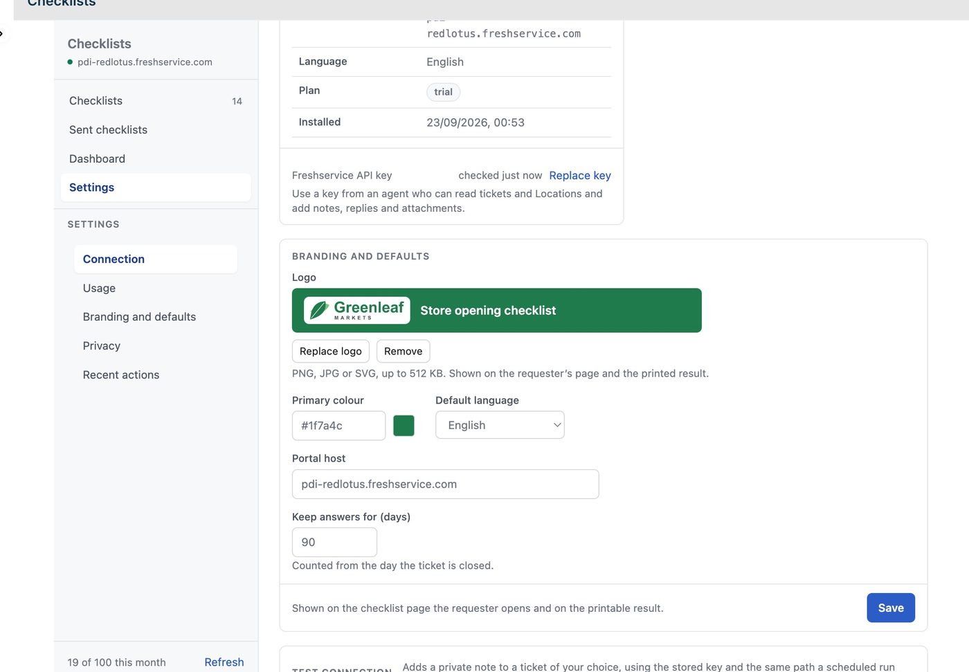A página de configurações do Checklists: os dados de conexão com a chave de API conferida agora, e o cartão de marca e padrões com o logo da Greenleaf numa faixa verde, a cor principal, o idioma padrão, o host do portal e respostas guardadas por 90 dias.